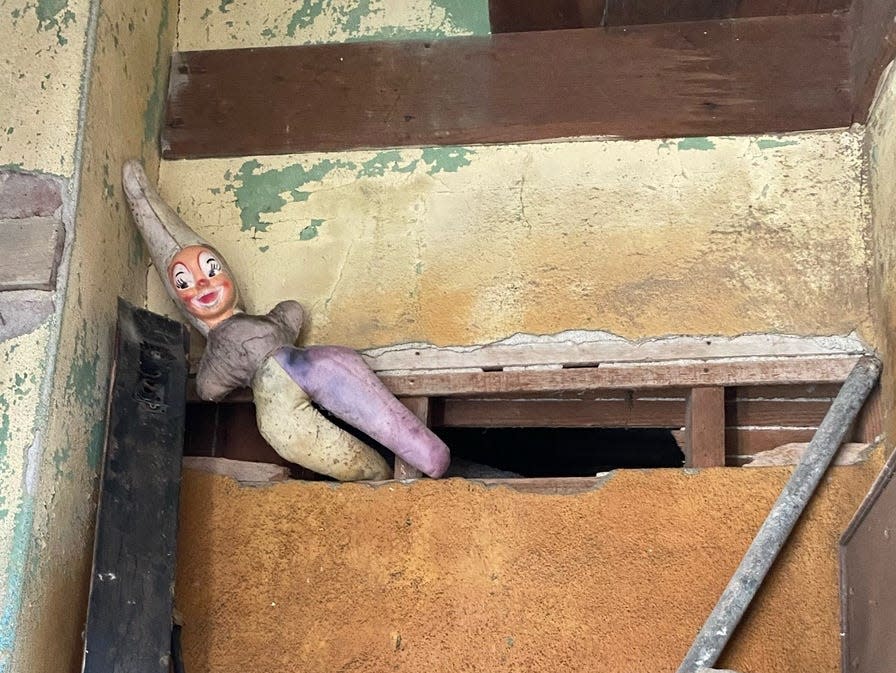 The couple discovered a creepy clown doll during the renovation.