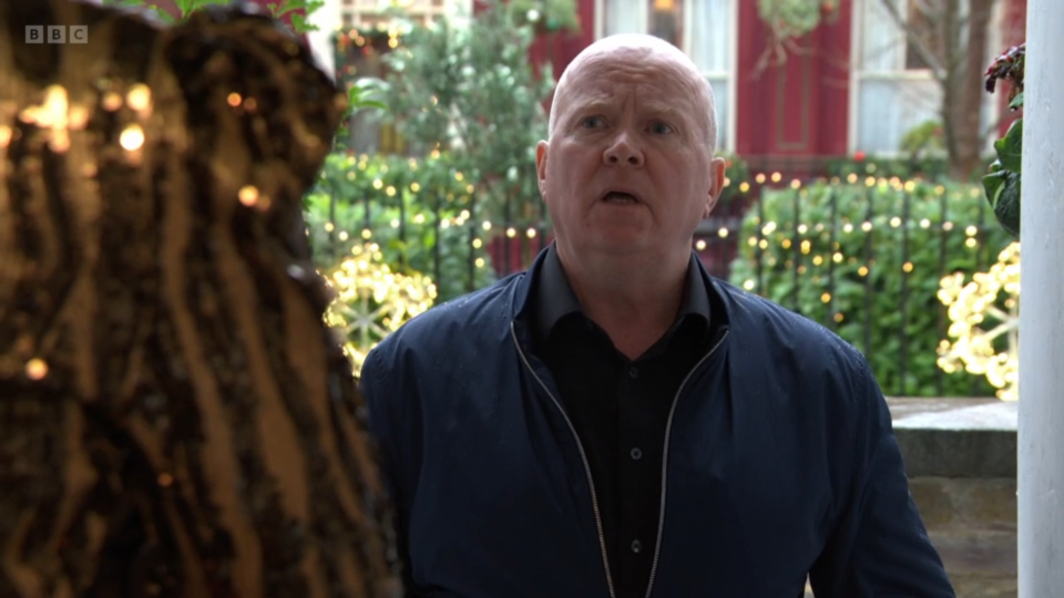 Phil Mitchell talking to Tara Misu at the doorstep.