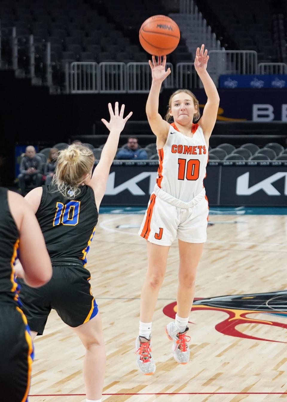 Jonesville's Julie Mach (10) takes a shot during Tuesday's game against Adrian Madison at Little Caesars Arena in Detroit.