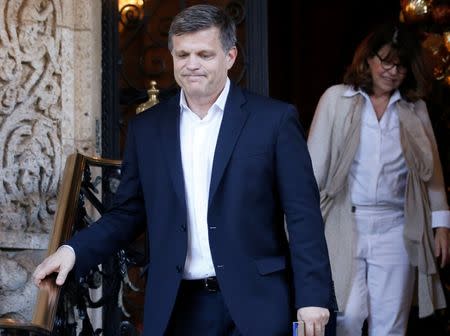 Historian Douglas Brinkley (L) and journalist Margaret Carlson (R) depart after meeting with U.S. President-elect Donald Trump at the Mar-a-Lago Club in Palm Beach, Florida, U.S. December 28, 2016. REUTERS/Jonathan Ernst