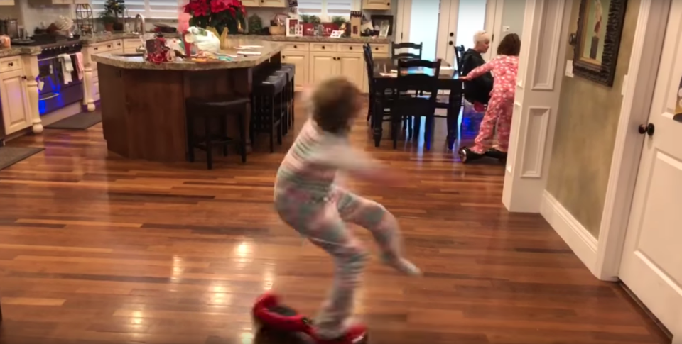 She spun completely off the hoverboard. Photo: YouTube/Kids Getting Hurt