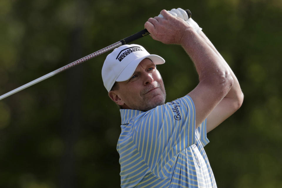 FILE - In this May 16, 2019, file photo, Steve Stricker hits off the seventh tee during the first round of the PGA Championship golf tournament, at Bethpage Black in Farmingdale, N.Y. The Senior PGA Championship opens Thursday, May 23, in Pittsford, N.Y. Stricker, who is splitting time between playing on the PGA and Champions Tour, was initially planning to compete at the PGA's Fort Worth Invitational this weekend, before electing to head to Oak Hill after winning the Champions Tour's first major _ The Regions Tournament _ two weeks ago. (AP Photo/Julio Cortez, File)