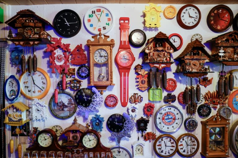 Some 366 clocks cover the walls in the living room of 76-year-old Werner Stechbarth's apartment in Munich (Michaela STACHE)