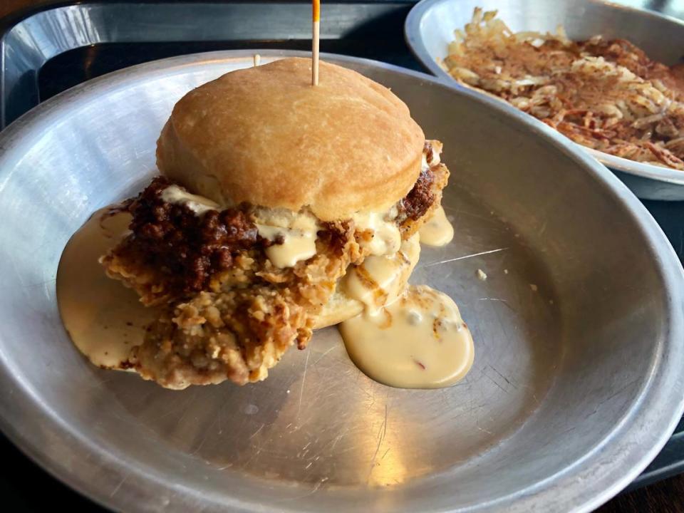 Chicken-fried steak on a biscuit with chili and queso at Ben’s Triple B.