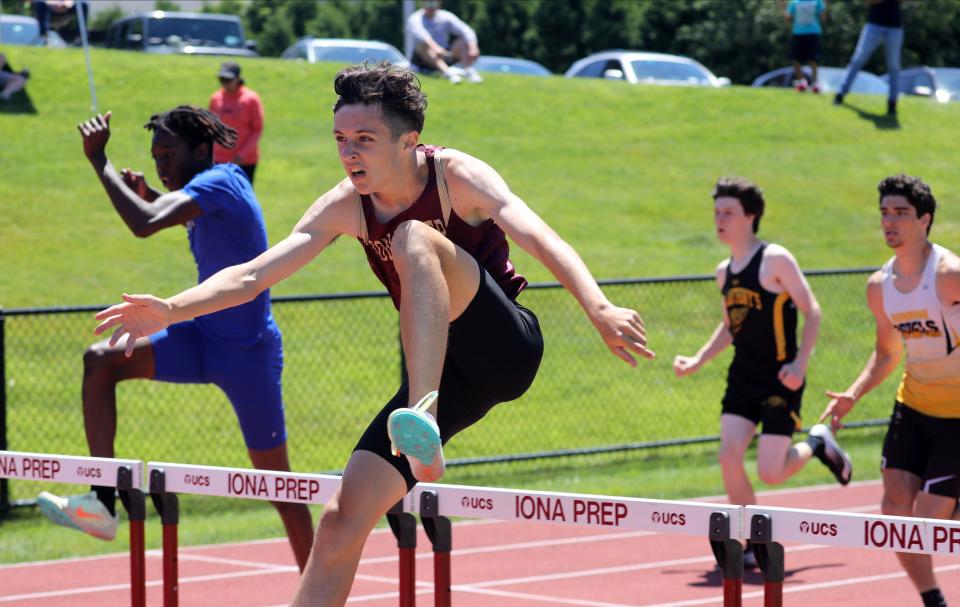 Peter Winter of Iona Prep competes in the 400 meter hurdles at the Eastern States track and field meet at Iona Prep in New Rochelle June 5, 2022.