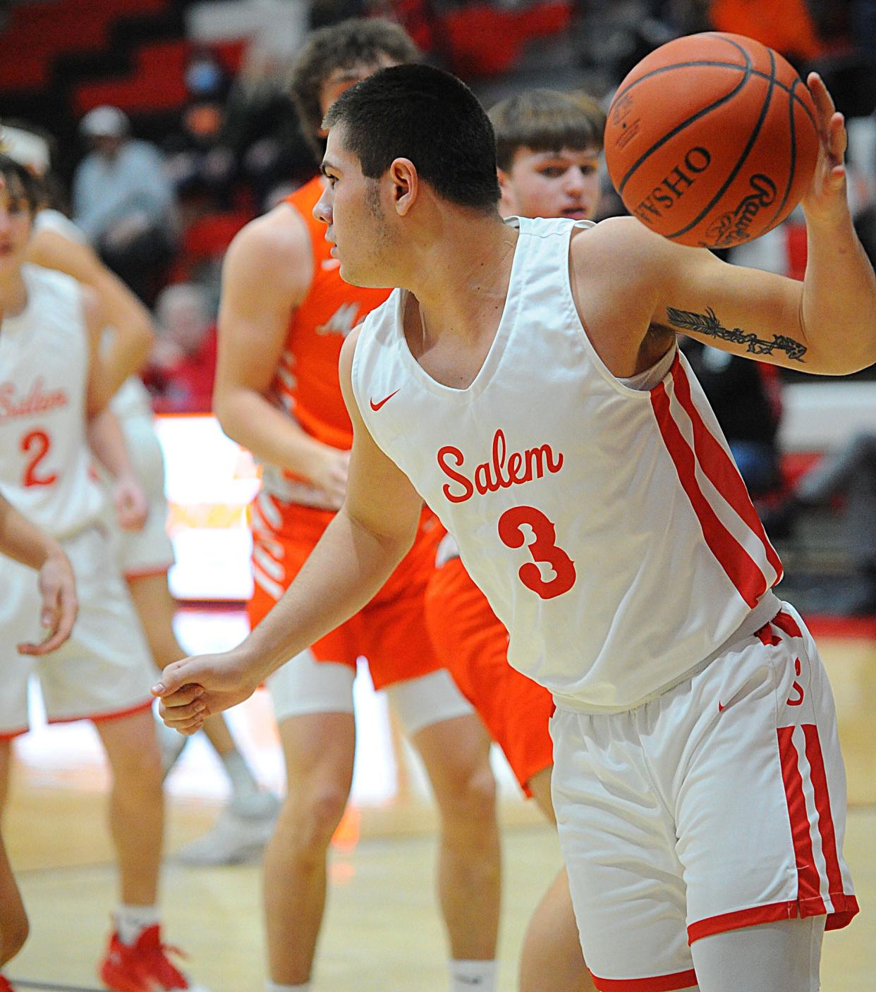 Salem's Brock Young controls a rebound in an Eastern Buckeye Conference game against Marlington at Salem High School Tuesday, January 25, 2022.