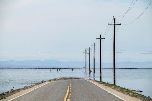 PHOTO: Flooded road is shown near Tulare Lake, located in California's Central Valley, on June 6, 2023. (Citizen of the Planet via UIG via Getty Images)