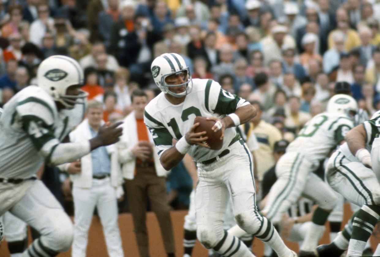 Joe Namath #12 of the New York Jets drops back to pass against the Baltimore Colts during Super Bowl III at the Orange Bowl on January 12, 1969 in Miami, Florida.