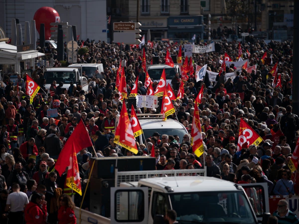 Protesters gather during a demonstration in Marseille, southern France (Daniel Cole/AP)