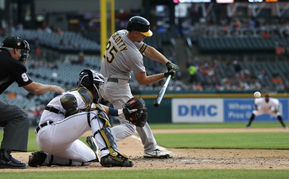 Oakland Athletics' Stephen Piscotty swings to connect for a two-run double to right field during the seventh inning of a baseball game against the Detroit Tigers, Sunday, May 19, 2019, in Detroit. (AP Photo/Carlos Osorio)