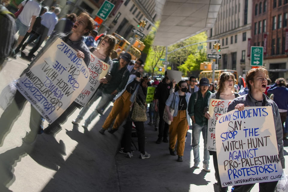 The New School students and pro-Palestinian supporters rally outside The New School University Center building, Monday, April 22, 2024, in New York. (AP Photo/Mary Altaffer)