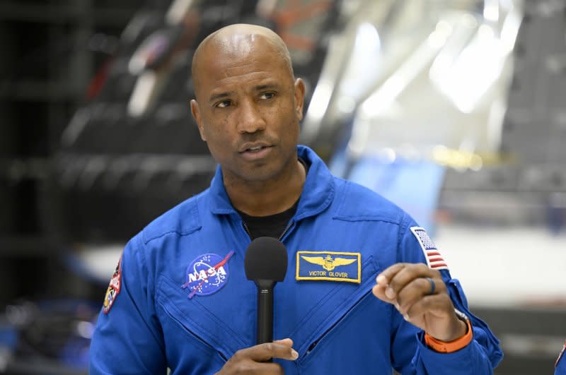 NASA's Artemis II pilot Victor Glover responds to questions from the media while visiting the Orion spacecraft Tuesday at Kennedy Space Center in Florida as it is being prepared for his mission planned for late 2024. Photo by Joe Marino/UPI