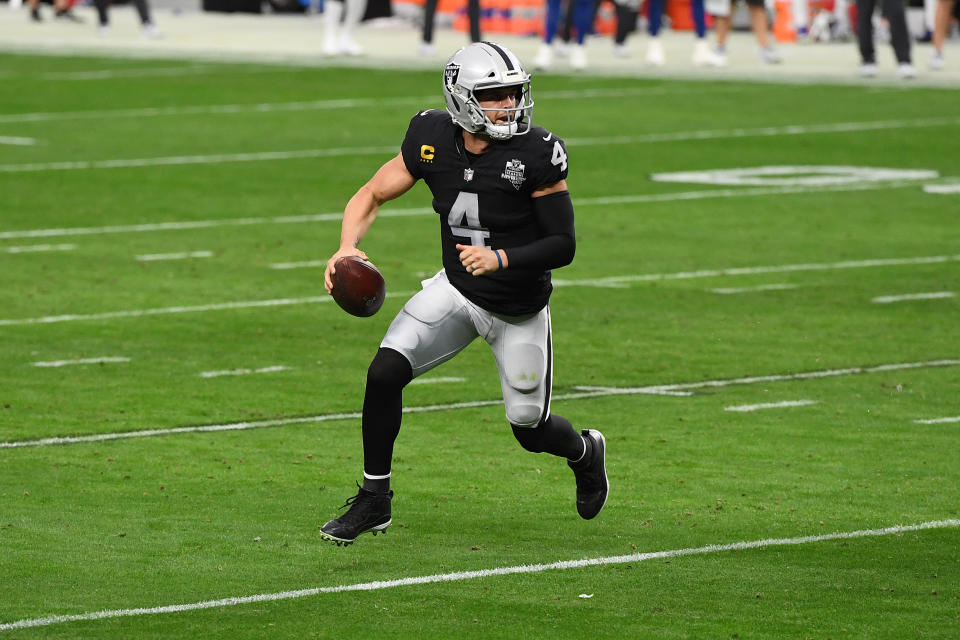 LAS VEGAS, NEVADA - DECEMBER 13: Las Vegas Raiders quarterback Derek Carr #4 scrambles against the Indianapolis Colts during the third quarter at Allegiant Stadium on December 13, 2020 in Las Vegas, Nevada. (Photo by Ethan Miller/Getty Images)