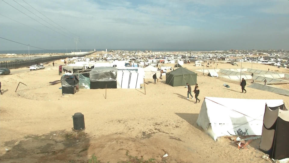 Tents and other makeshift shelters set up by displaced Palestinians are seen in the Philadelphi Corridor, a demilitarized zone that extends 100 meters (109 yards) into southern Gaza from the border with Egypt, Jan. 17, 2024. / Credit: CBS News