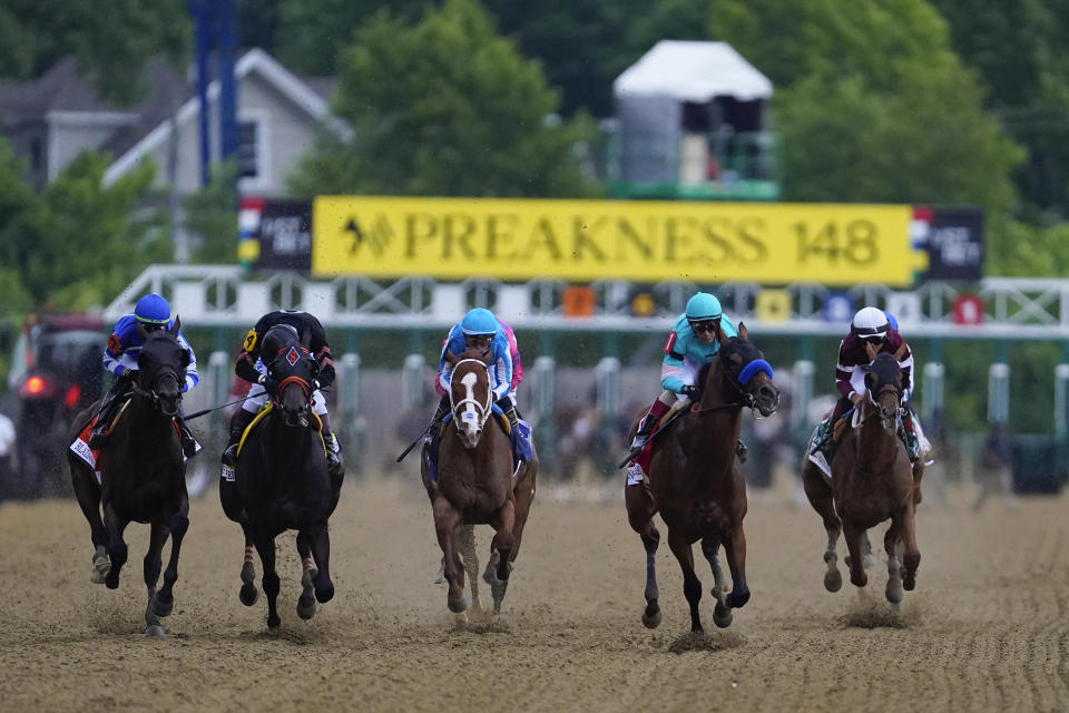 FILE - Horses compete during the148th running of the Preakness Stakes horse race at Pimlico Race Course, Saturday, May 20, 2023, in Baltimore. Horse deaths marred last year’s Kentucky Derby, Preakness and Breeders’ Cup, with officials finding no single factor to blame. (AP Photo/Nick Wass, File)