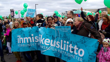 Protesters take part in a demonstration against racism and far right movements in downtown Helsinki, Finland, September 24, 2016. REUTERS/Attila Cser