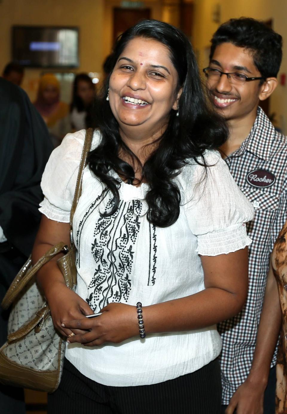 Indira with her two older children in court earlier this year. - The Malaysian Insider pic, June 19, 2014.