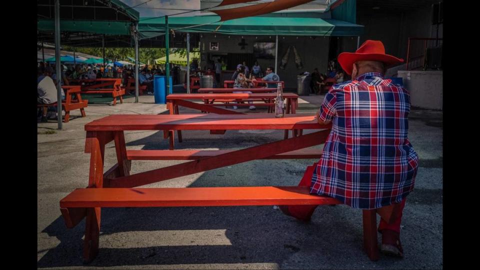 Images by photographer Carlos “Cali” Muñoz document immigrant life at the Redland Market in Homestead.