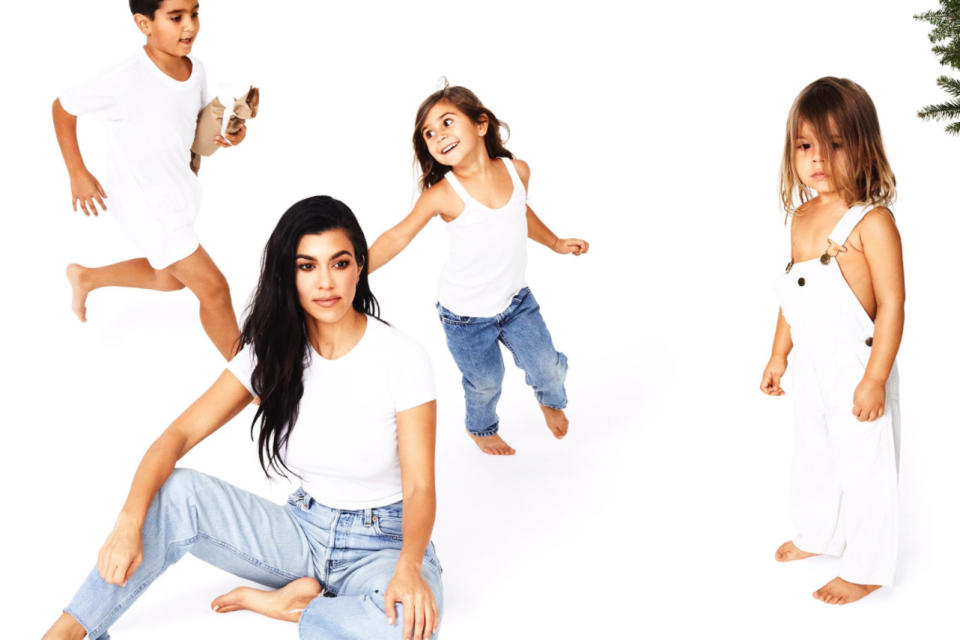 <p>Kourtney poses while Mason, Penelope, and Reign frolick behind her. (Photo: Eli Russell Linnetz/Kim Kardashian via Twitter) </p>