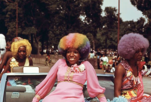 PHOTO: Women sit on a float during the Bud Billiken Day parade in Chicago, in August, 1973.  (John White/US National Archives via Getty Images)