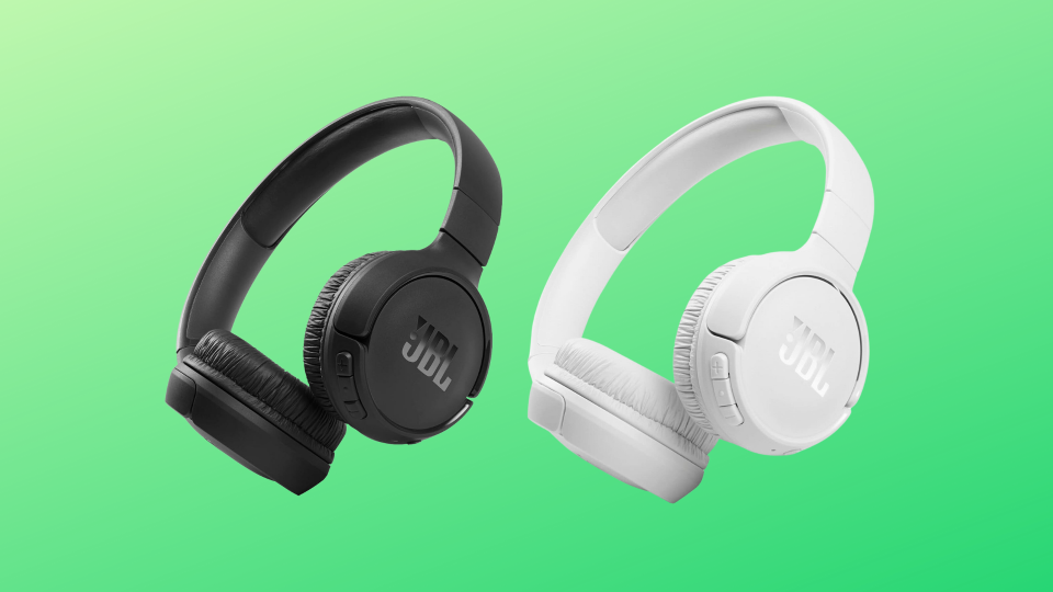 JBL headphones against a green background