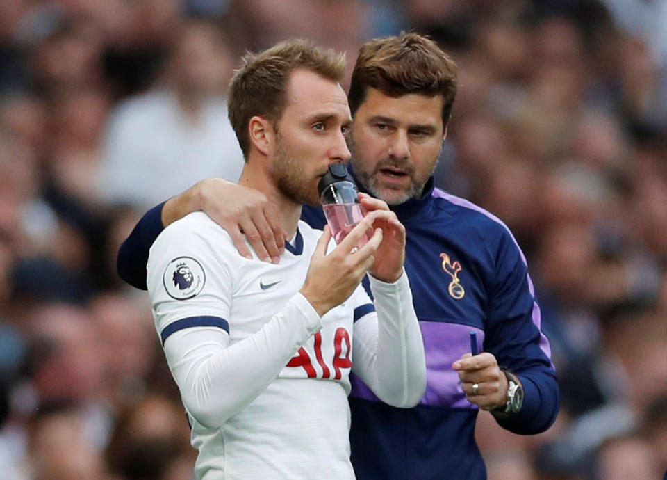 Soccer Football - Premier League - Tottenham Hotspur v Aston Villa - Tottenham Hotspur Stadium, London, Britain - August 10, 2019  Tottenham's Christian Eriksen with manager Mauricio Pochettino before coming on to replace Harry Winks   Action Images via Reuters/Matthew Childs  EDITORIAL USE ONLY. No use with unauthorized audio, video, data, fixture lists, club/league logos or "live" services. Online in-match use limited to 75 images, no video emulation. No use in betting, games or single club/league/player publications.  Please contact your account representative for further details.