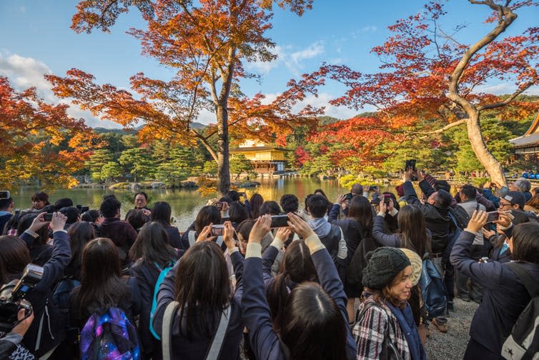 <span class="caption">Kyoto: beautiful view, shame about the crowds.</span> <span class="attribution"><a class="link " href="https://www.shutterstock.com/download/confirm/253190572?src=tLOOySlY7dF2dLhFbGabXQ-1-9&size=medium_jpg" rel="nofollow noopener" target="_blank" data-ylk="slk:Shutterstock;elm:context_link;itc:0;sec:content-canvas">Shutterstock</a></span>