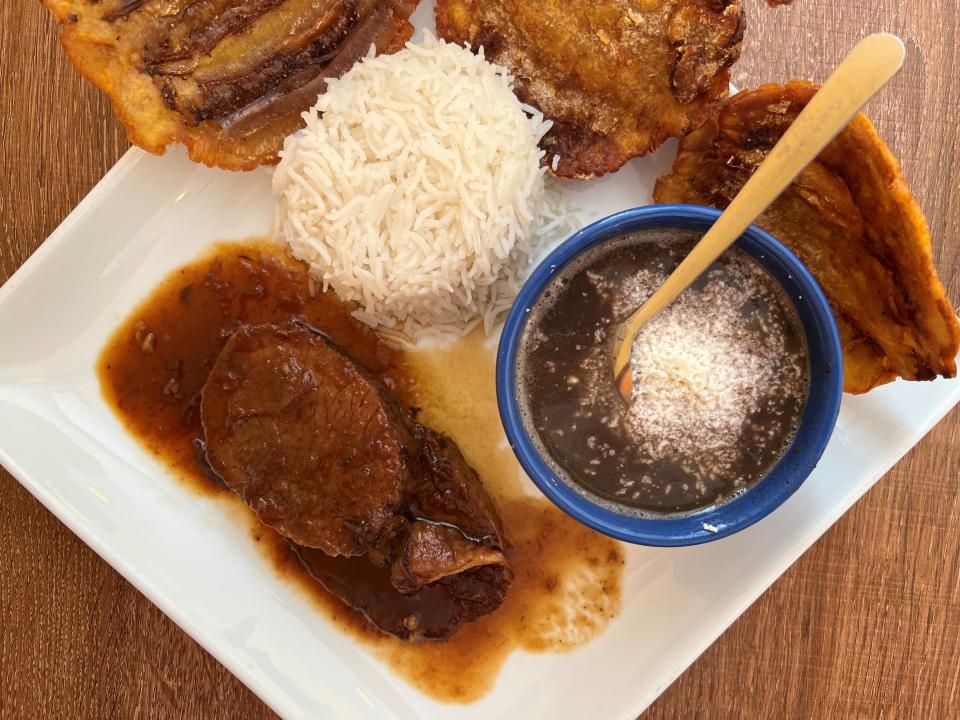 The asado negro Venezolano is a cut of beef smothered in a dark sweet sauce for $15.