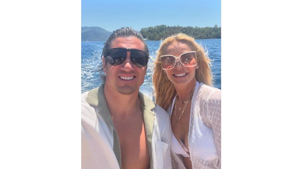 couple posing for selfie on boat 