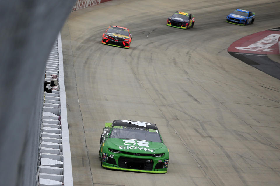 DOVER, DELAWARE - OCTOBER 06: Kyle Larson, driver of the #42 Clover Chevrolet, leads a pack of cars during the Monster Energy NASCAR Cup Series Drydene 400 at Dover International Speedway on October 06, 2019 in Dover, Delaware. (Photo by Chris Trotman/Getty Images)