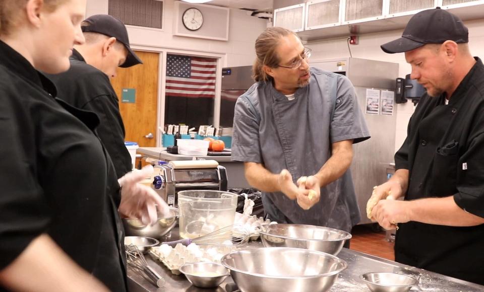 Chef instructor Anthony Eugenio, third from left, instructs students Michelle Taylor of Long Branch, William Berry of Asbury Park and Thomas Williams of Asbury Park in the Second Chance culinary program.