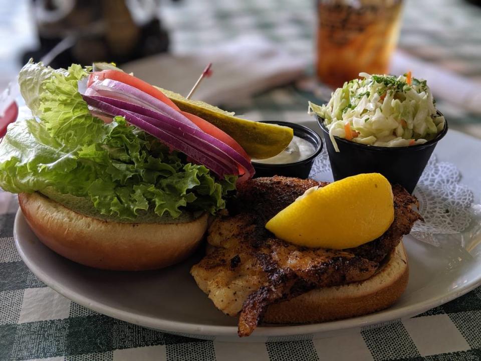 A blackened grouper sandwich with housemade coleslaw at Linger Lodge.