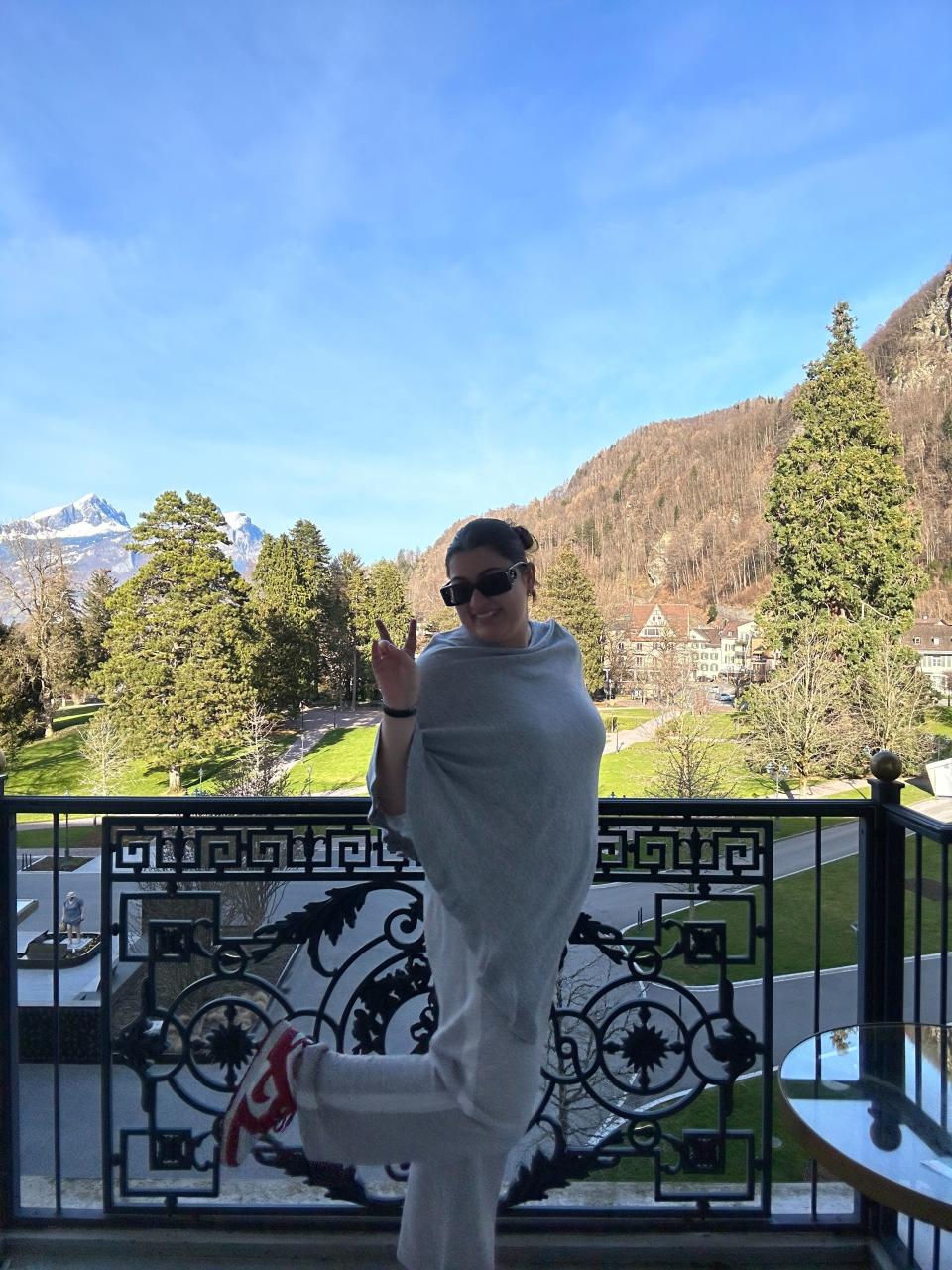 Author Priya Raj on the balcony of her Swiss hotel suite