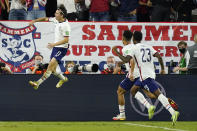 United States forward Brenden Aaronson (11) celebrates after scoring a goal against Canada during the second half of a World Cup soccer qualifier Sunday, Sept. 5, 2021, in Nashville, Tenn. (AP Photo/Mark Humphrey)