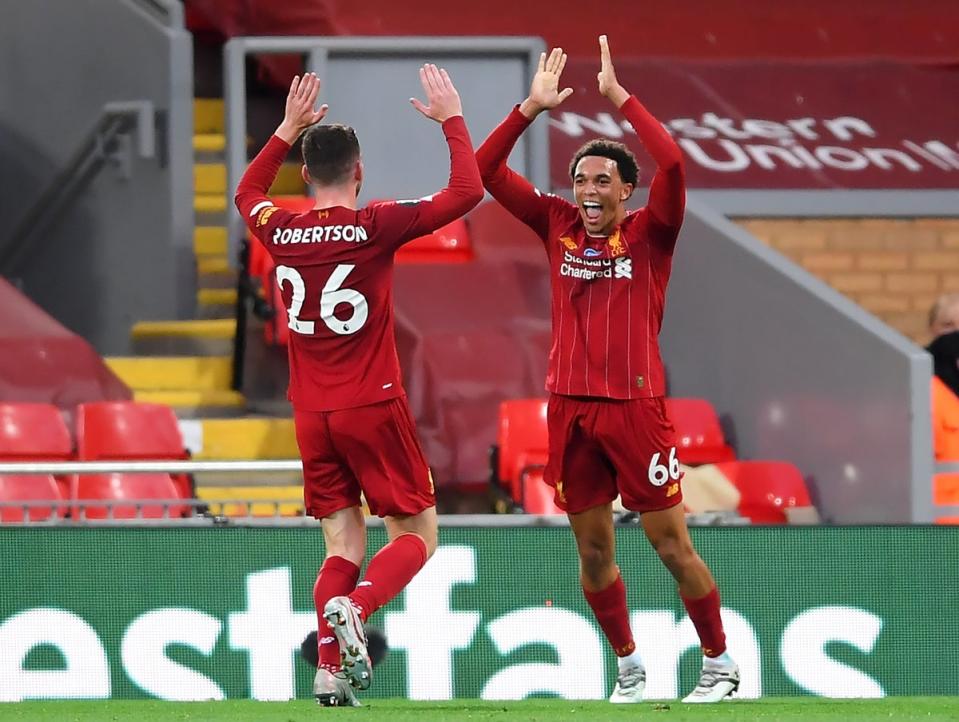 Liverpool full-backs Andy Robertson and Trent Alexander-Arnold enjoy a friendly rivalry (Laurence Griffiths/PA) (PA Archive)