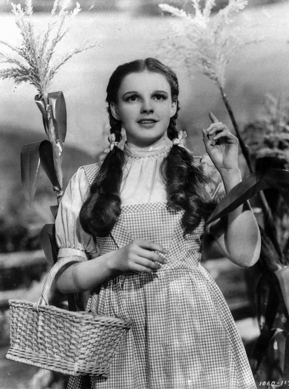 FILE - In this 1939 file photo originally released by Warner Bros., Judy Garland portrays Dorothy in a scene from "The Wizard of Oz." (AP Photo/Warner Bros., file)