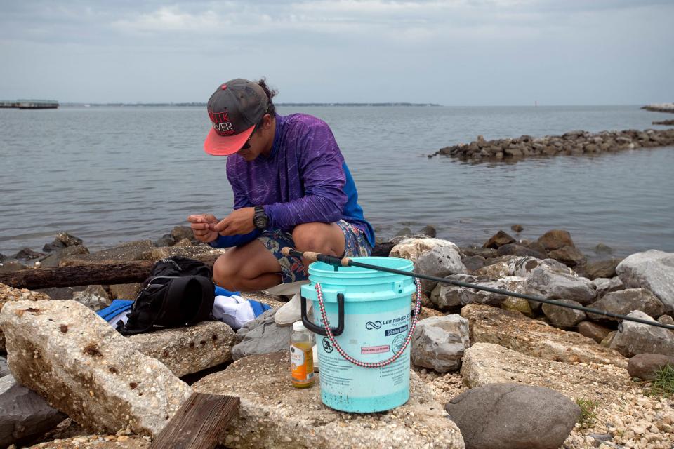 Ben Vincent tries his luck fishing for redfish at Bruce Beach on Monday, May 23, 2022.