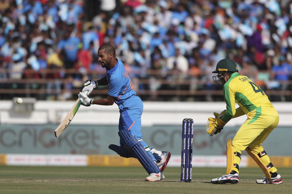 India's Shikhar Dhawan plays a shot during the second one-day international cricket match between India and Australia in Rajkot, India, Friday, Jan. 17, 2020. (AP Photo/Ajit Solanki)