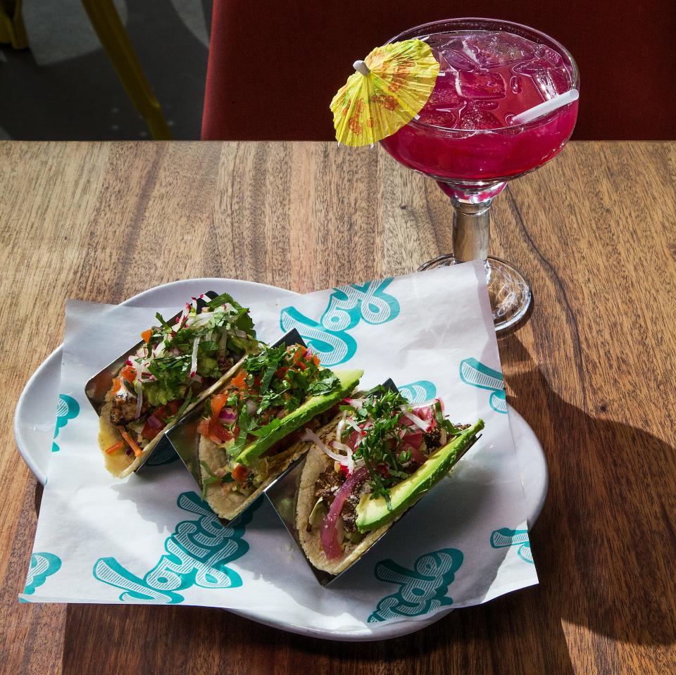 A taco plate and prickly pear margarita from Joyride Taco House.