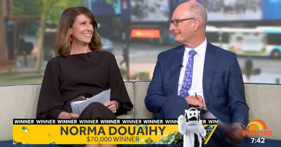 Sunrise hosts Nat Barr and Kochie looking at each other.