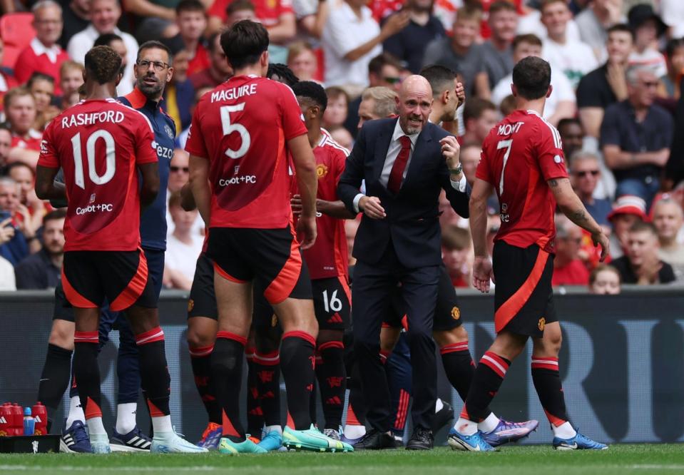 Erik ten Hag is being backed to bring Manchester United more trophies and rebuild their reputation after years of decline. (The FA via Getty Images)