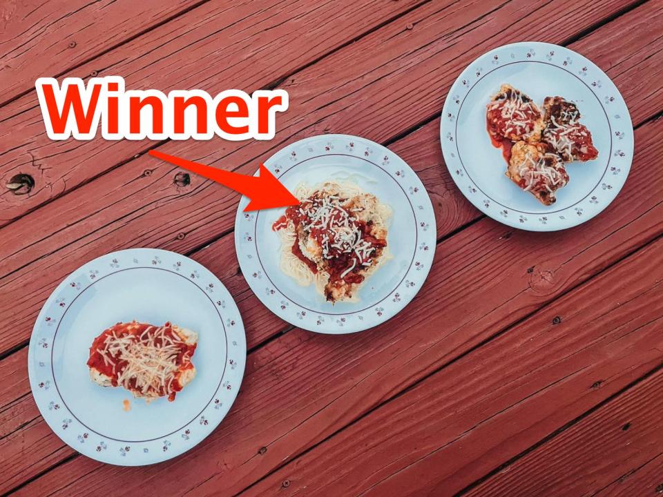 three plates of chicken parmesan on white plates in a row on a wooden table