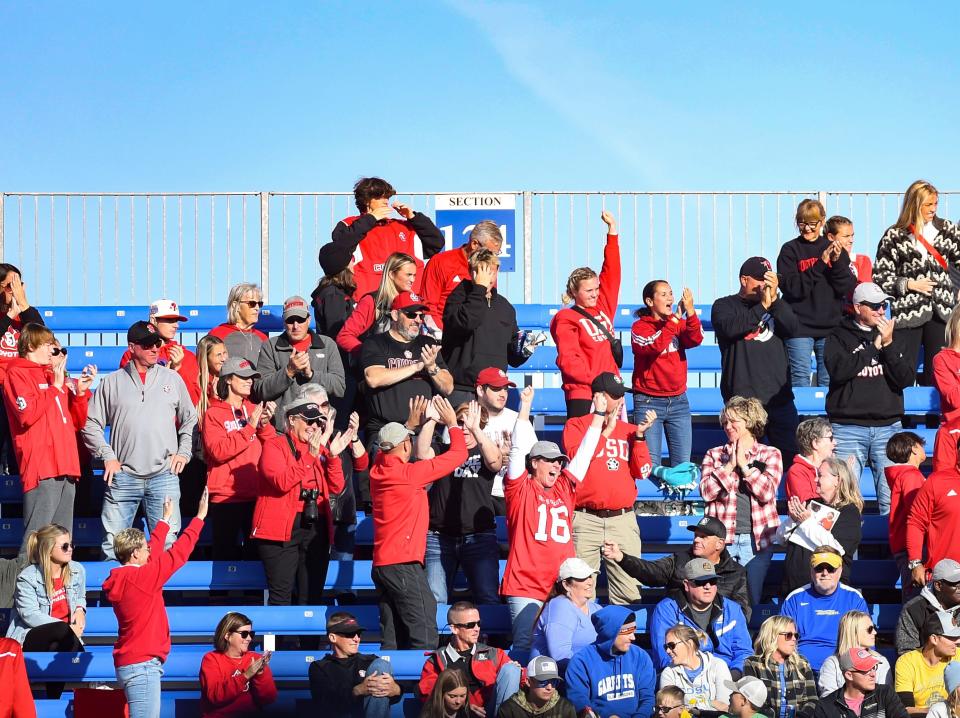 South Dakota fans cheer after an interception in their favor in a football game against South Dakota State on Saturday, October 8, 2022, at Dana J. Dykhouse Stadium in Brookings.