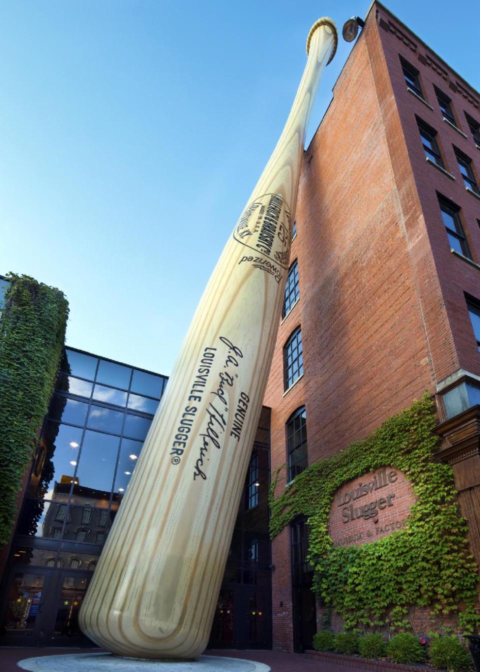 This undated image released by the Louisville Slugger Museum & Factory shows the exterior of their building. Visitors can trace that baseball heritage along the Louisville Slugger Walk of Fame, stretching about a mile from the Louisville Slugger Museum & Factory to the city’s minor-league ballpark. (AP Photo/Hillerich & Bradsby, James Moses)