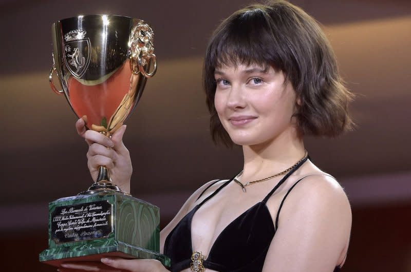 Cailee Spaeny poses with the Volpi Cup for Best Actress Award for "Priscilla" at the winner's photocall at the 80th Venice International Film Festival on Saturday. Photo by Rocco Spaziani/UPI