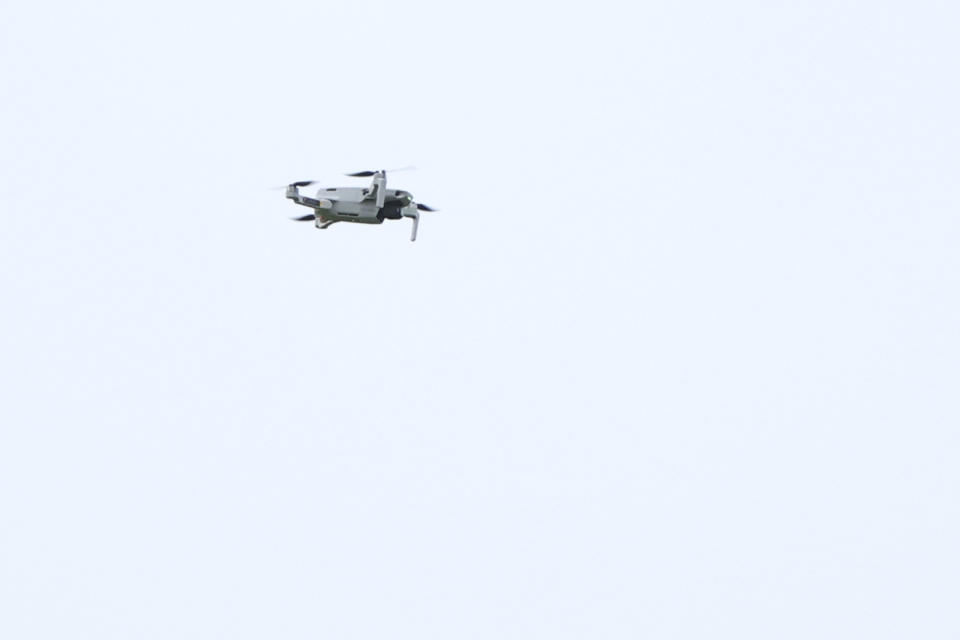 A drone hovers above the field during the English Premier League soccer match between Brentford and Wolverhampton Wanderers at the Brentford Community Stadium in Brentford, England Saturday, Jan. 22, 2022. (AP Photo/Ian Walton)