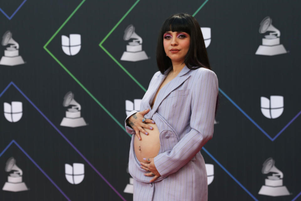 Chilean singer, songwriter and musician Mon Laferte wore an incredible outfit with a specially designed bump-cut out at the Latin Grammy Awards last night. (Getty Images)