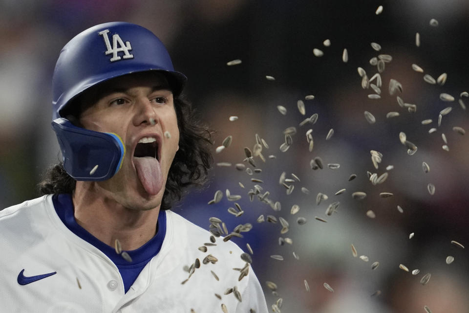 Los Angeles Dodgers' James Outman celebrates after hitting a home run during the second inning of a baseball game against the Miami Marlins in Los Angeles, Monday, May 6, 2024. Gavin Lux also scored. (AP Photo/Ashley Landis)