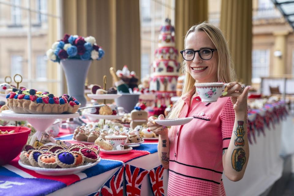 Artist Lucy Sparrow with her Platinum Jubilee banquet made out of felt (Kirsty O’Connor/PA) (PA Wire)