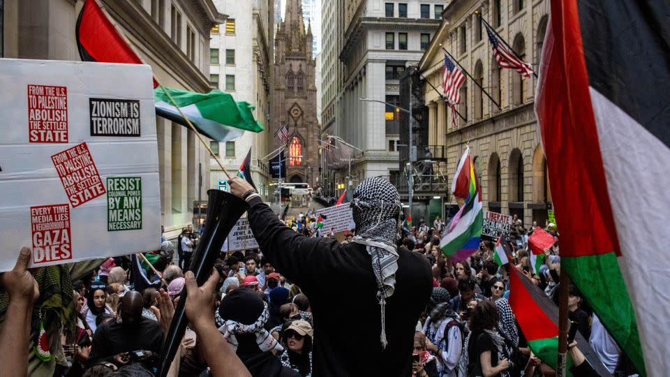 Demonstrators hold a rally in support of Palestine outside the Nova Music Festival Exhibition in New York City on June 10, 2024. The exhibition pays tribute to the victims of the October 7 attack by Hamas on an Israeli music festival. - Jonathan Fernandes/Sipa USA